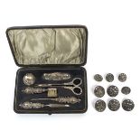 A six piece silver cased ladies manicure set and a set of buttons.