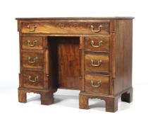 A 19th Century mahogany kneehole desk.