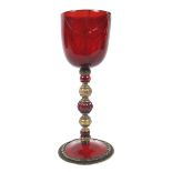 A late 17th century ruby glass and silver-gilt mounted goblet.