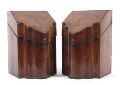 A pair of George III mahogany knife boxes of serpentine form.