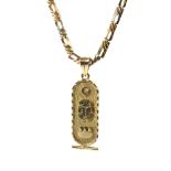 A vintage Egyptian yellow metal necklace and pendant.