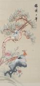 A 20th century Chinese silk needlework picture of two pheasants perched amongst flowering trees.