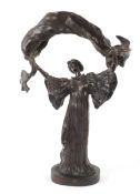 A bronze Art Nouveau style figure of a dancer after Agathon Leonard (1841-1923).