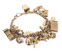 A 9ct rose gold fancy figure-of-eight link 'charm' bracelet.