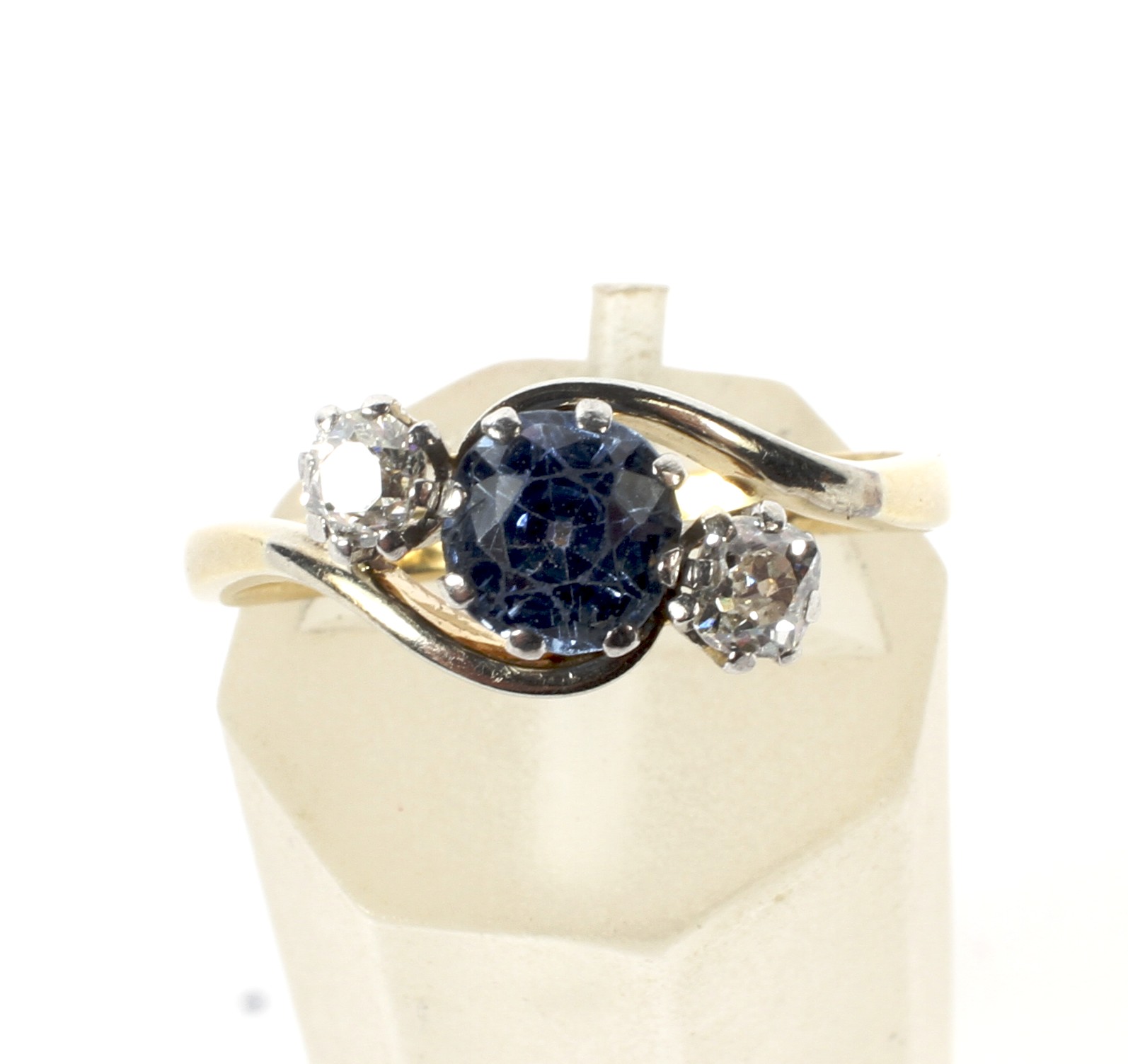 A mid 20th century gold, sapphire and diamond three stone cross-over ring. - Image 5 of 6