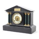 A late 19th century American cast metal mantel clock by the Ansonia clock company.