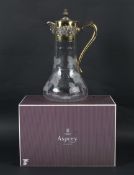 An Asprey silver-gilt mounted claret jug.