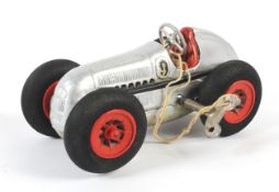 A 1950s Schuco Studio Model No. 50 silver Mercedes racing car.