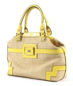 A yellow Anya Hindmarch handbag with dust bag,