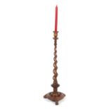 A Victorian turned walnut barley twist candle stand.