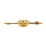 An early 20th century gold 'Naval crown' badge bar brooch. Stamped '9ct', 50mm long overall, 3.3g.