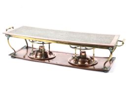 A fine Hammered copper twin handled heating tray.