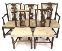 A set of five 19th Century oak dining chairs.