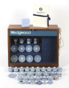 A retro Wedgwood cabinet top shop display case and a collection of Wedgwood miniature jasperware.