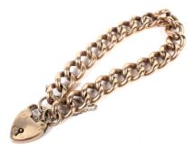 An Edwardian 9ct rose gold hollow curb link bracelet.