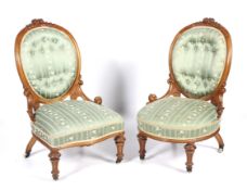 A pair of Victorian satin birch salon chairs.