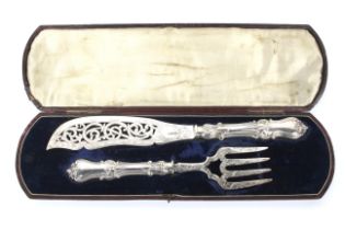 Pair of Victorian silver fish servers. With original tooled leather blue velvet lined fitted case.