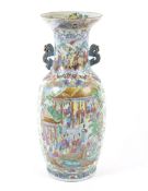 A large 19th century Canton famille rose oviform vase.