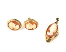 A pair of vintage Italian oval shell cameo stud earrings and a similarly set pendant.