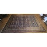 A Persian woollen carpet.