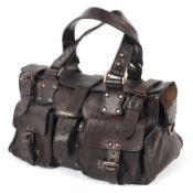 A Mulberry Roxanne dark brown leather handbag.