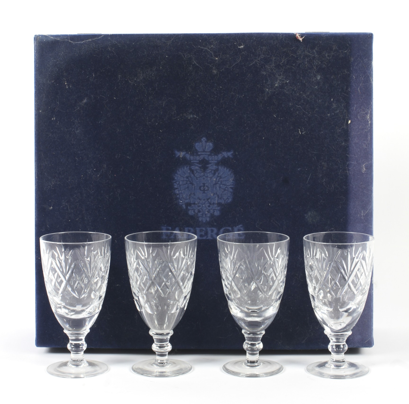 A cased set of four cut-glass Faberge drinking glasses. - Image 2 of 2