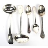 Two silver ladles, a dessert spoon and two teaspoons.