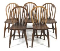 Five early 20th century elm kitchen chairs.