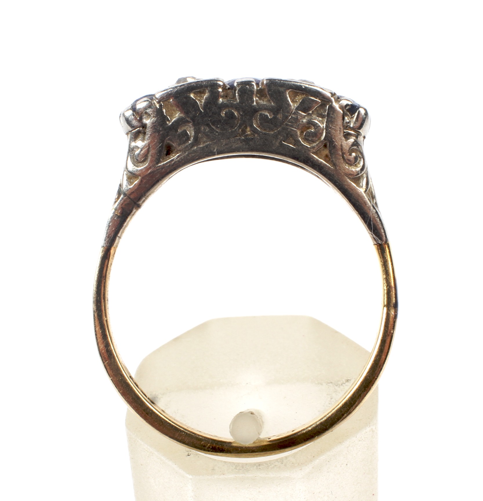 An early 20th century gold, sapphire and diamond carved half-hoop ring. - Image 3 of 4