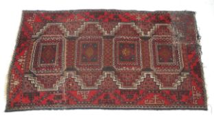 A 20th century Iranian wool rug.