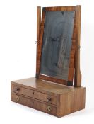 An early 19th century mahogany dressing table mirror.