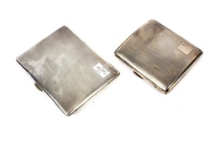 Two silver cigarette cases, both with engine turned decoration.