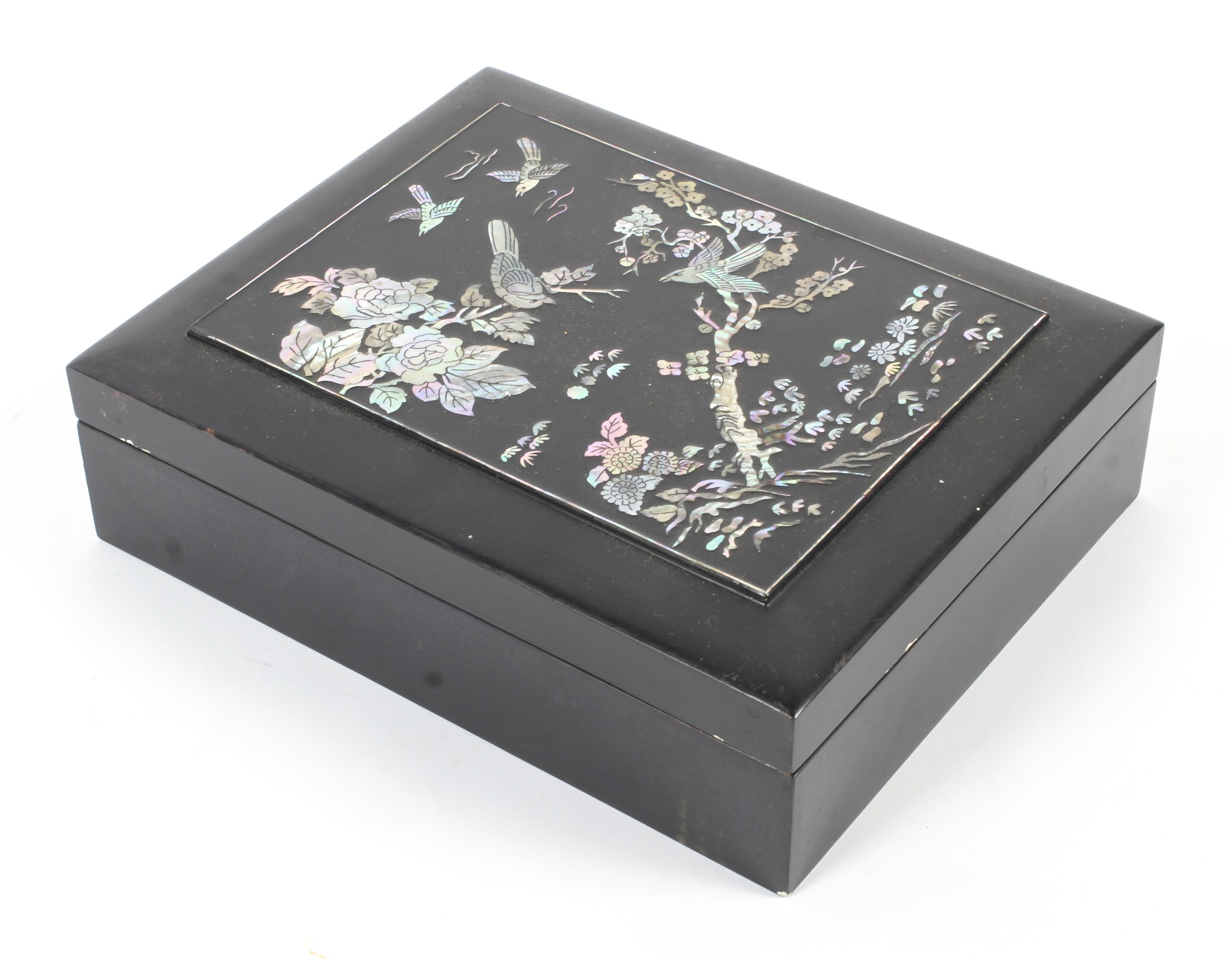 A 20th century Asian lacquered and mother of pearl mounted box and cover.
