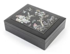 A 20th century Asian lacquered and mother of pearl mounted box and cover.