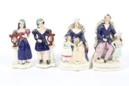 A pair of 19th century Staffordshire pottery figures.