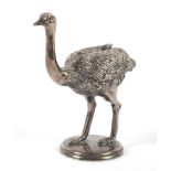 A silver-plated ostrich paper weight.