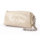 A Chanel nude leather handbag.