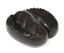 A coco-de-mer (Seychelles) hollowed out and polished two-section basket. With serrated rim, 29.