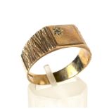 A 9ct gold square signet ring.