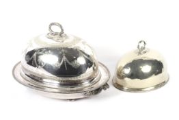 A large Edwardian silver-plated meat-dish warmer and two domed covers in sizes.