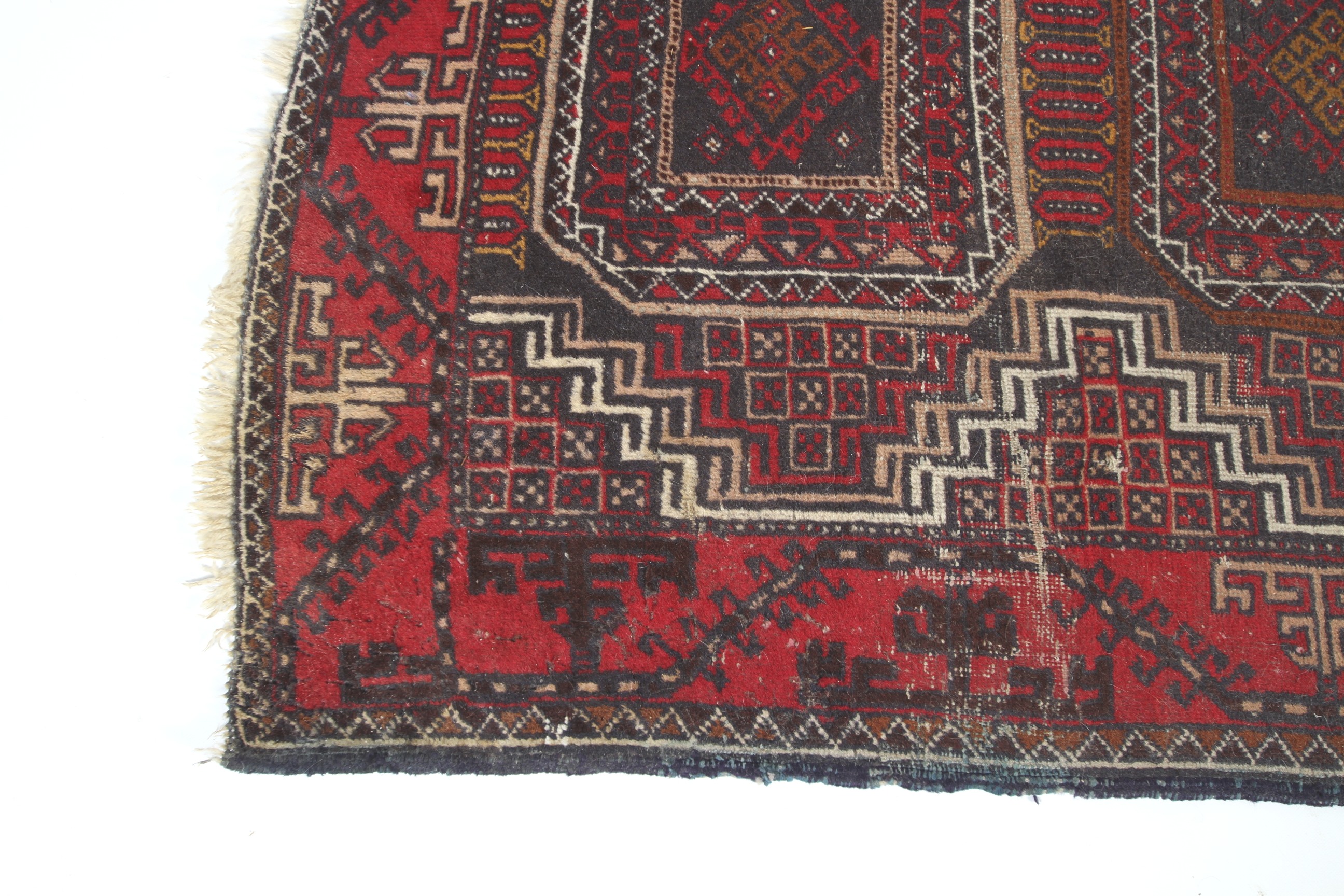 A 20th century Iranian wool rug. - Image 2 of 3