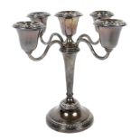 A silver swivel four branch candelabra.