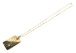 A 9ct gold and diamond rectangular 'calendar' pendant and necklace.