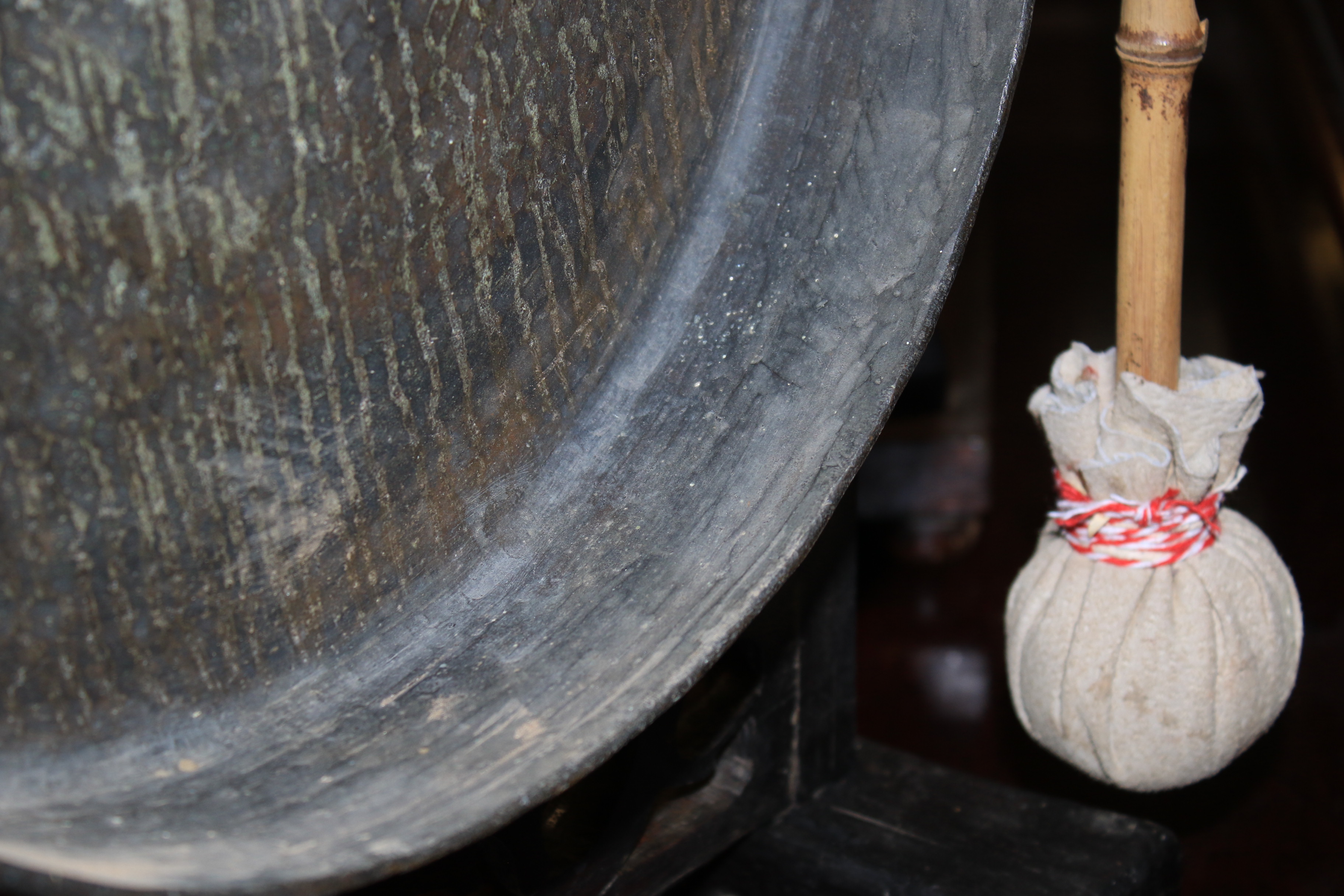 A Chinese gong raised on a carved ebonised stand. - Image 12 of 18