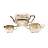 A 20th century silver three piece tea set.