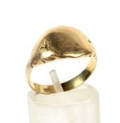 An early 20th century gold oblong signet ring. Stamped '18ct', size M, 4.8g gross.