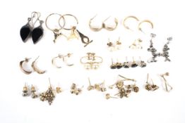 A collection of earrings.