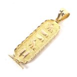 A 20th century Egyptian 18ct yellow gold pendant.
