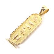 A 20th century Egyptian 18ct yellow gold pendant.