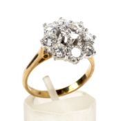 A vintage diamond nine stone cluster ring. Centred with a round brilliant diamond approx. 0.